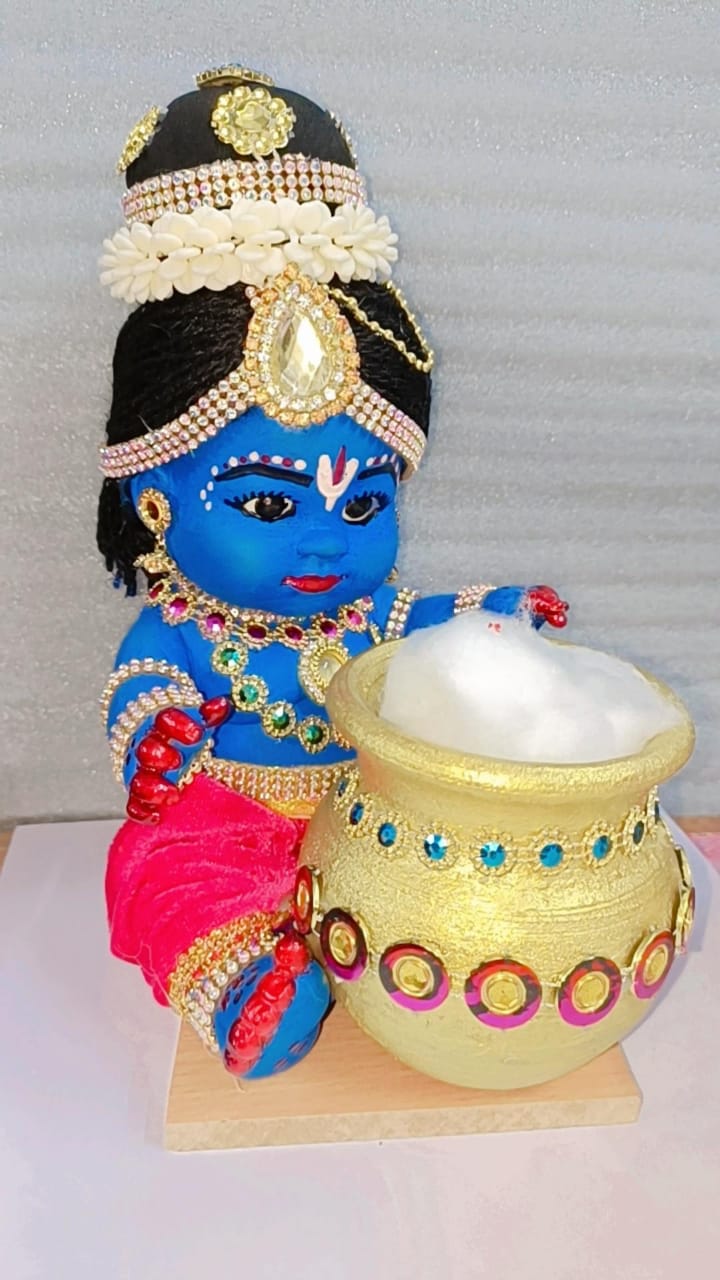 Krishna eating butter 